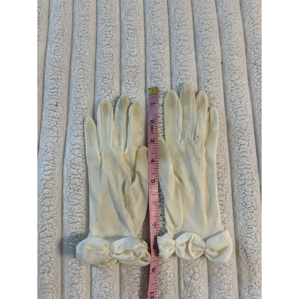 Vintage woman’s gloves 1960’s white stretch Bows at wrist